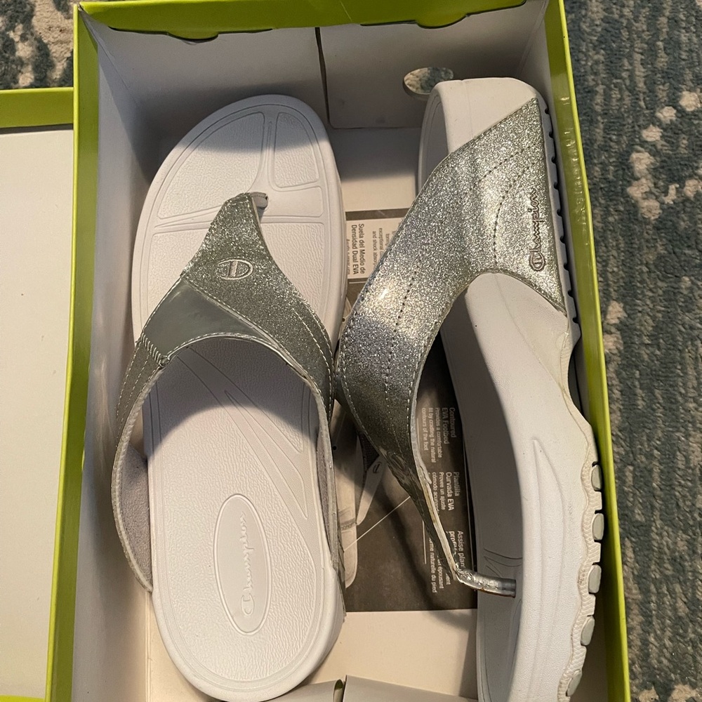 Champion flip flop sandals white and silver in color like new size 11